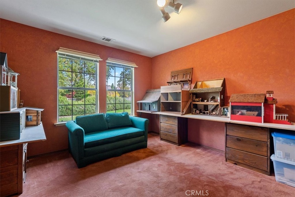 1505 Barley Grain Road Paso Robles, CA 93446 - Photo 22 of 56 a living room with furniture a flat screen tv and a window