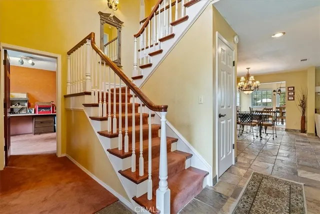 a view of a hallway with windows