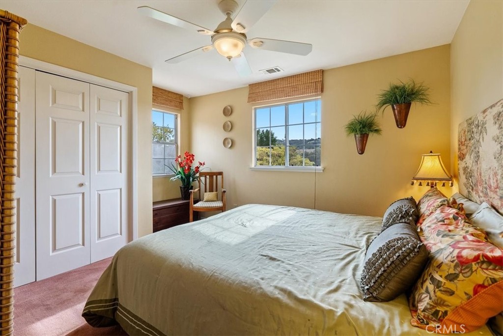 1505 Barley Grain Road Paso Robles, CA 93446 - Photo 29 of 56 a bedroom with a bed and a window