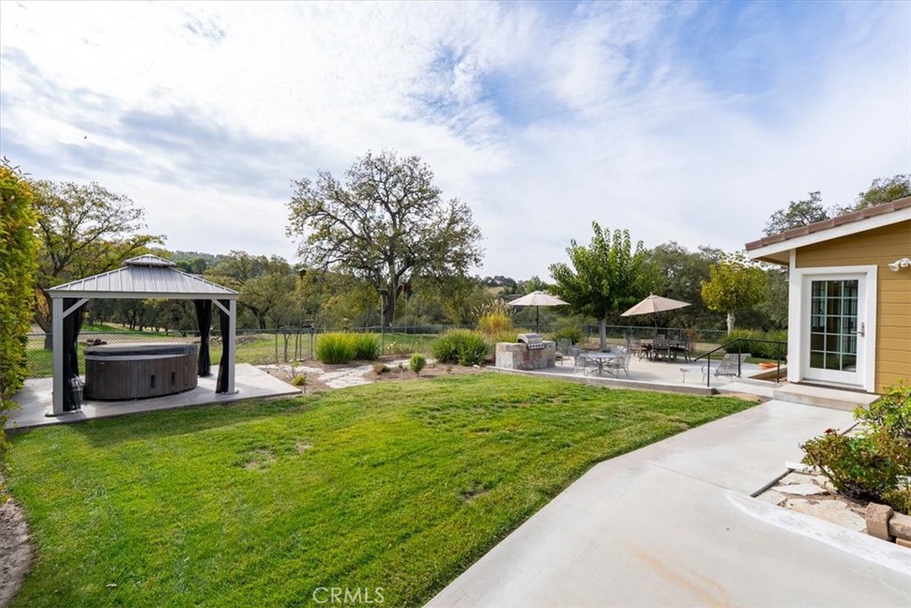 1505 Barley Grain Road Paso Robles, CA 93446 - Photo 34 of 56 a swimming pool with outdoor seating and yard