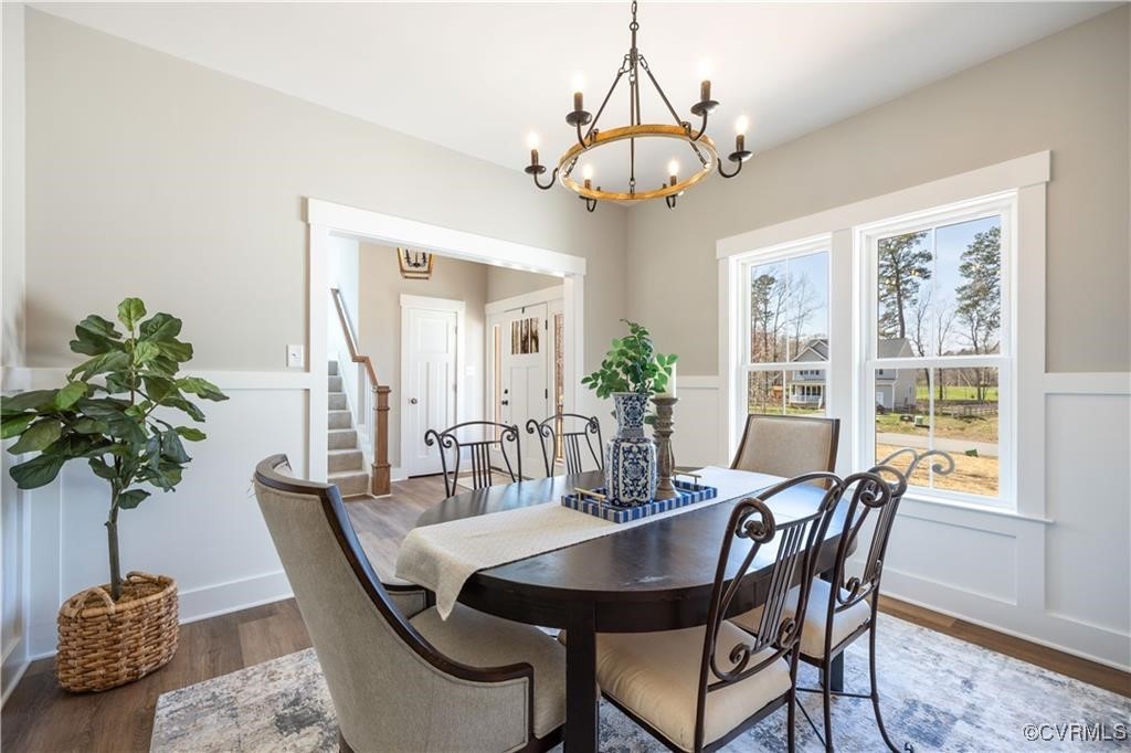 12036 Corte Castle Road Chesterfield, VA 23838 - Photo 15 of 31 a view of a dining room with furniture window and wooden floor