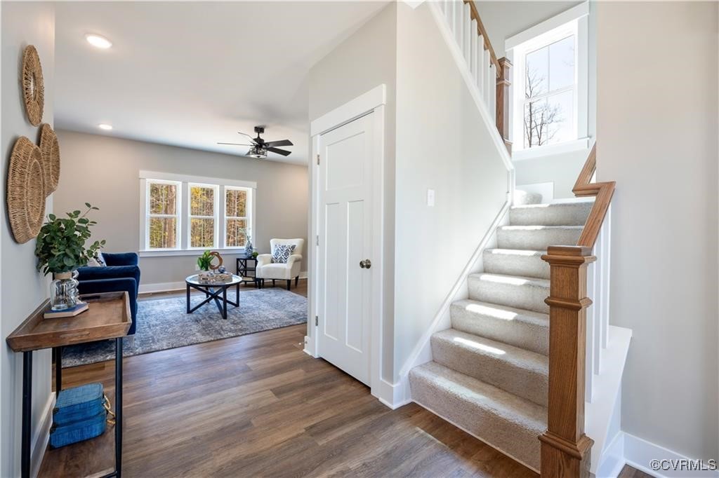 12036 Corte Castle Road Chesterfield, VA 23838 - Photo 16 of 31 a view of a hallway with wooden floor and furniture