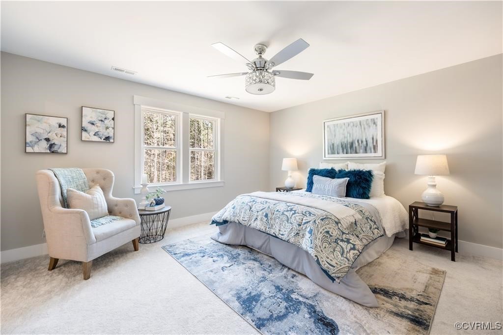 12036 Corte Castle Road Chesterfield, VA 23838 - Photo 17 of 31 a bedroom with a bed and a couch