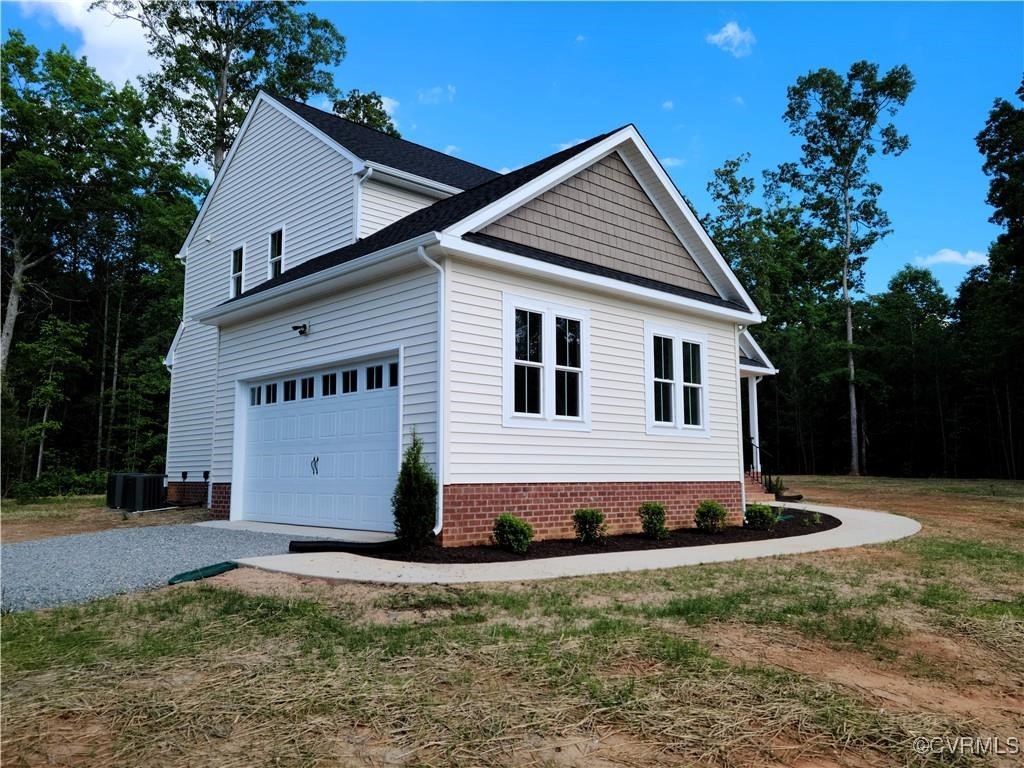 12036 Corte Castle Road Chesterfield, VA 23838 - Photo 2 of 31 a view of a house with backyard and trees