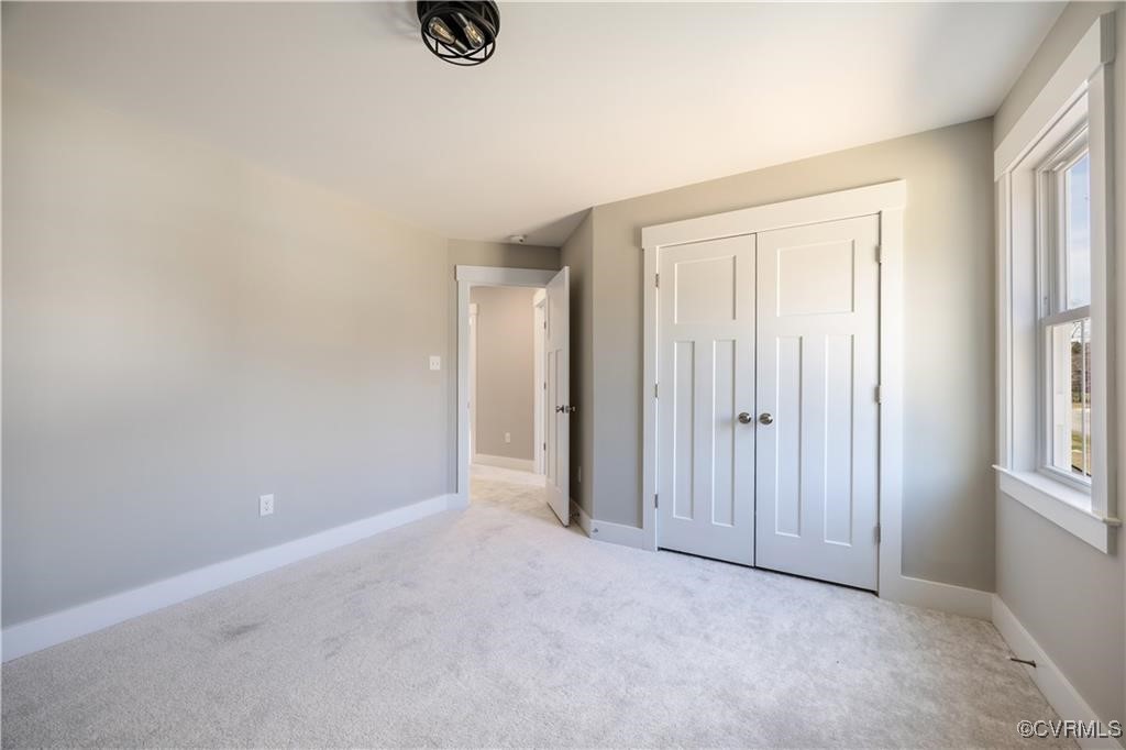 12036 Corte Castle Road Chesterfield, VA 23838 - Photo 22 of 31 an empty room with windows and closet
