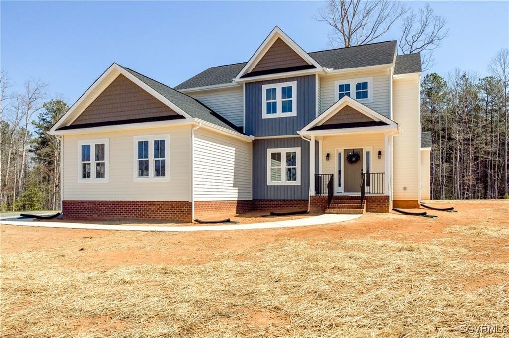 12036 Corte Castle Road Chesterfield, VA 23838 - Photo 30 of 31 a front view of a house with a yard