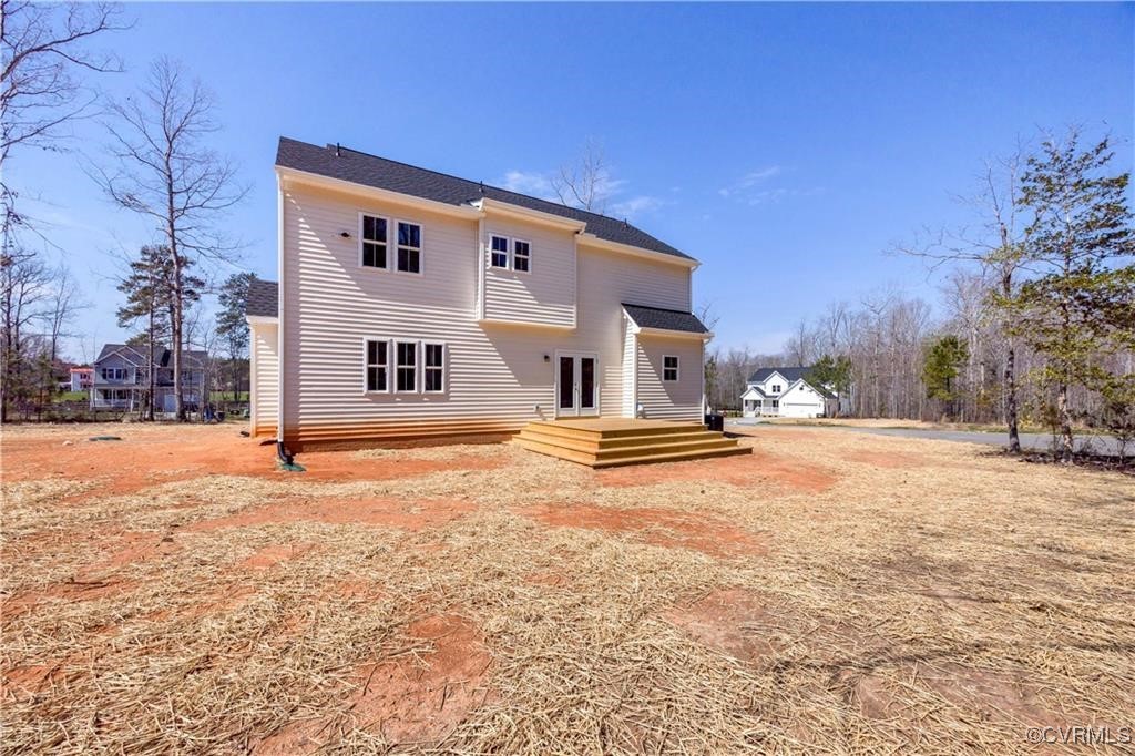 12036 Corte Castle Road Chesterfield, VA 23838 - Photo 3 of 31 a front view of a house with a yard