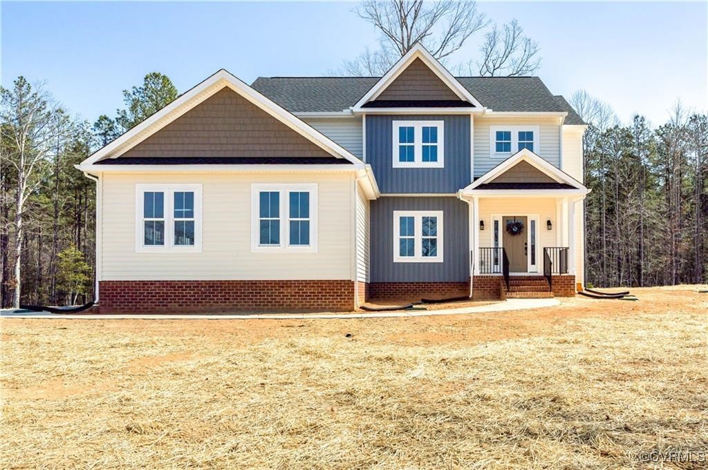 12036 Corte Castle Road Chesterfield, VA 23838 - Photo 31 of 31 a front view of a house with a yard