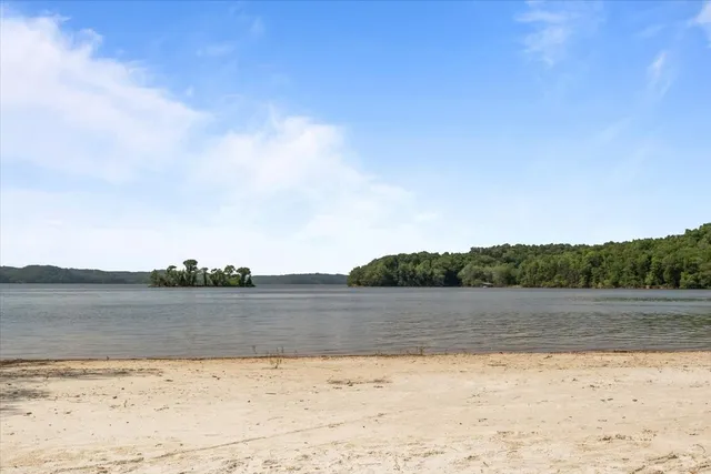 a view of a yard with swimming pool