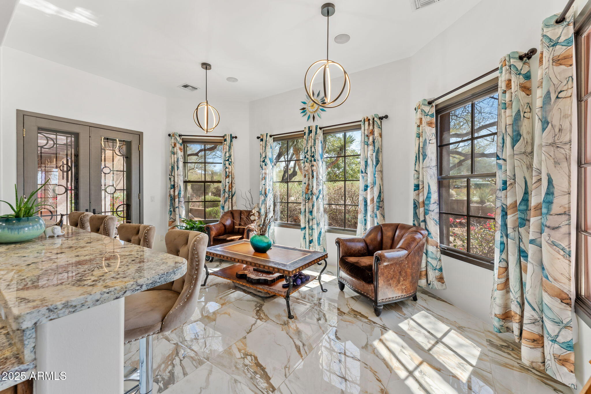 5100 East Cloud Road Cave Creek, AZ 85331 - Photo 11 of 43 a living room with furniture and floor to ceiling windows