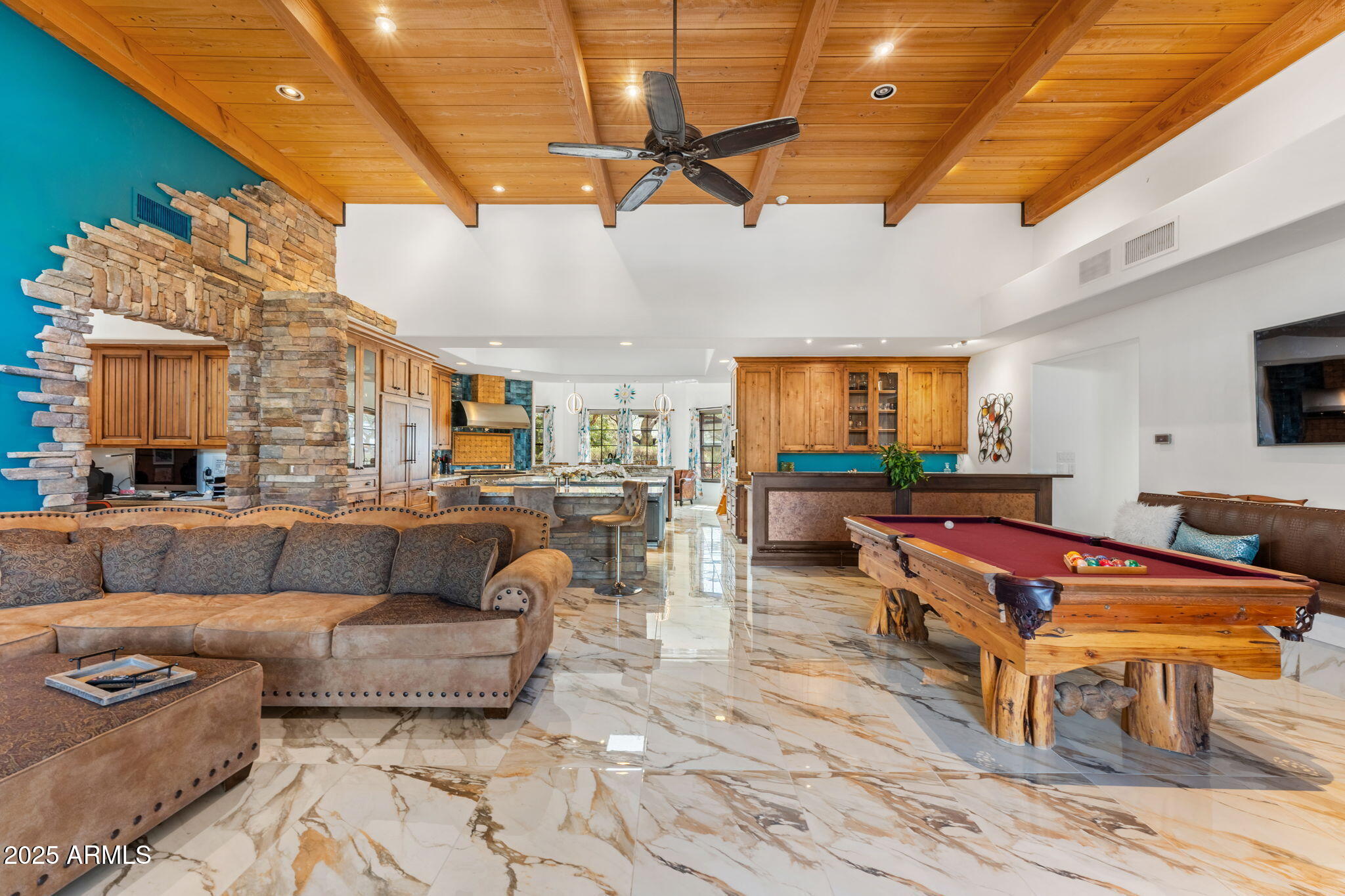5100 East Cloud Road Cave Creek, AZ 85331 - Photo 12 of 43 a living room with furniture and a flat screen tv