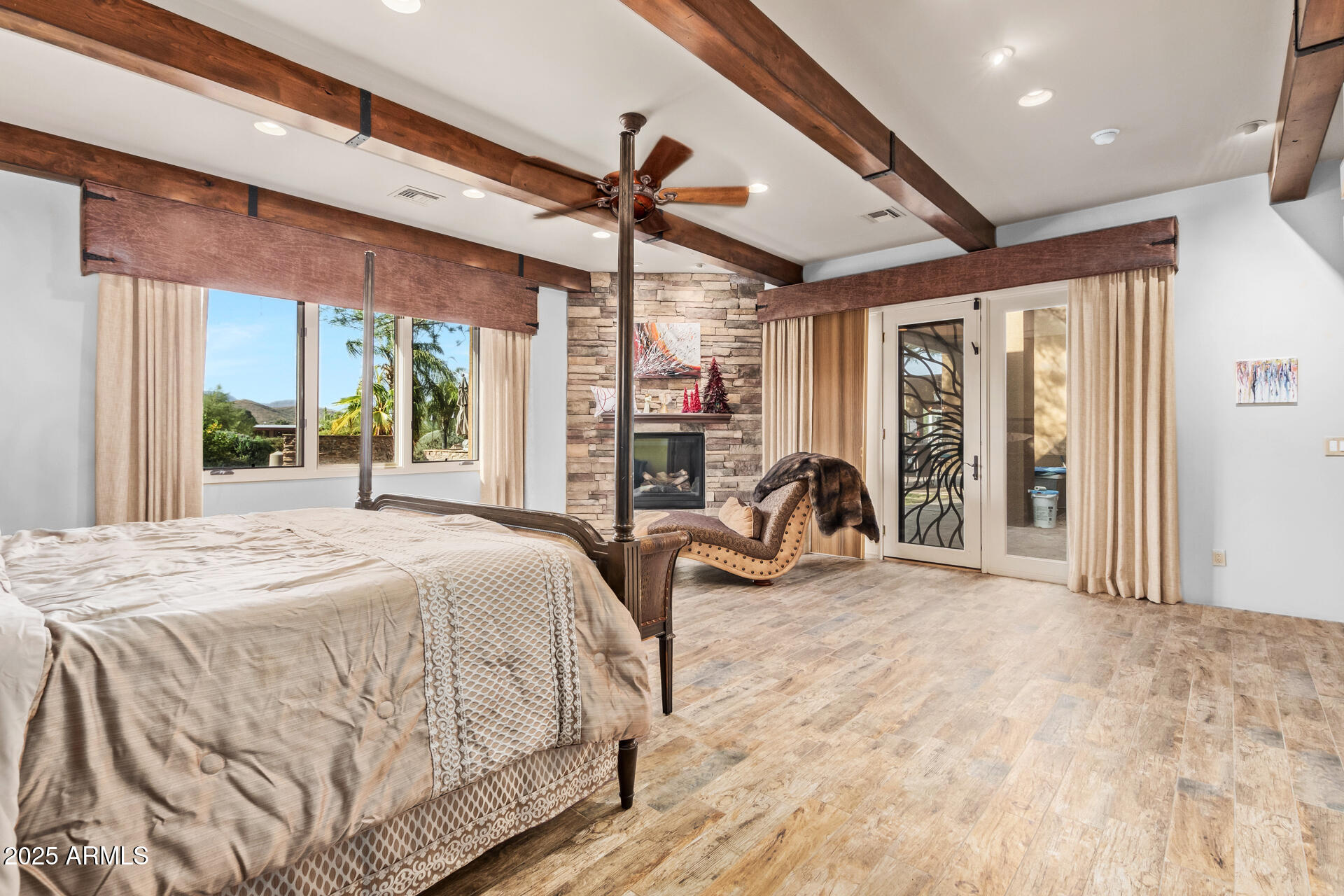 5100 East Cloud Road Cave Creek, AZ 85331 - Photo 18 of 43 a bed room with a bed and a large window