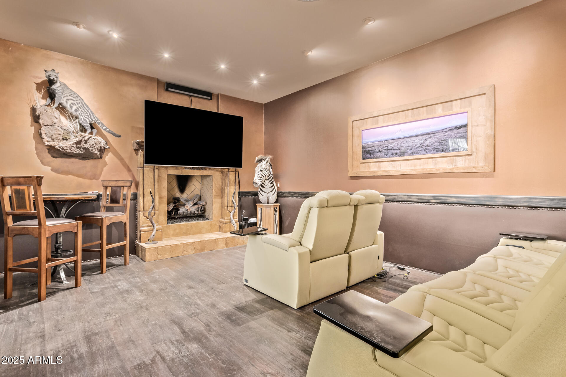 5100 East Cloud Road Cave Creek, AZ 85331 - Photo 20 of 43 a living room with furniture and a flat screen tv
