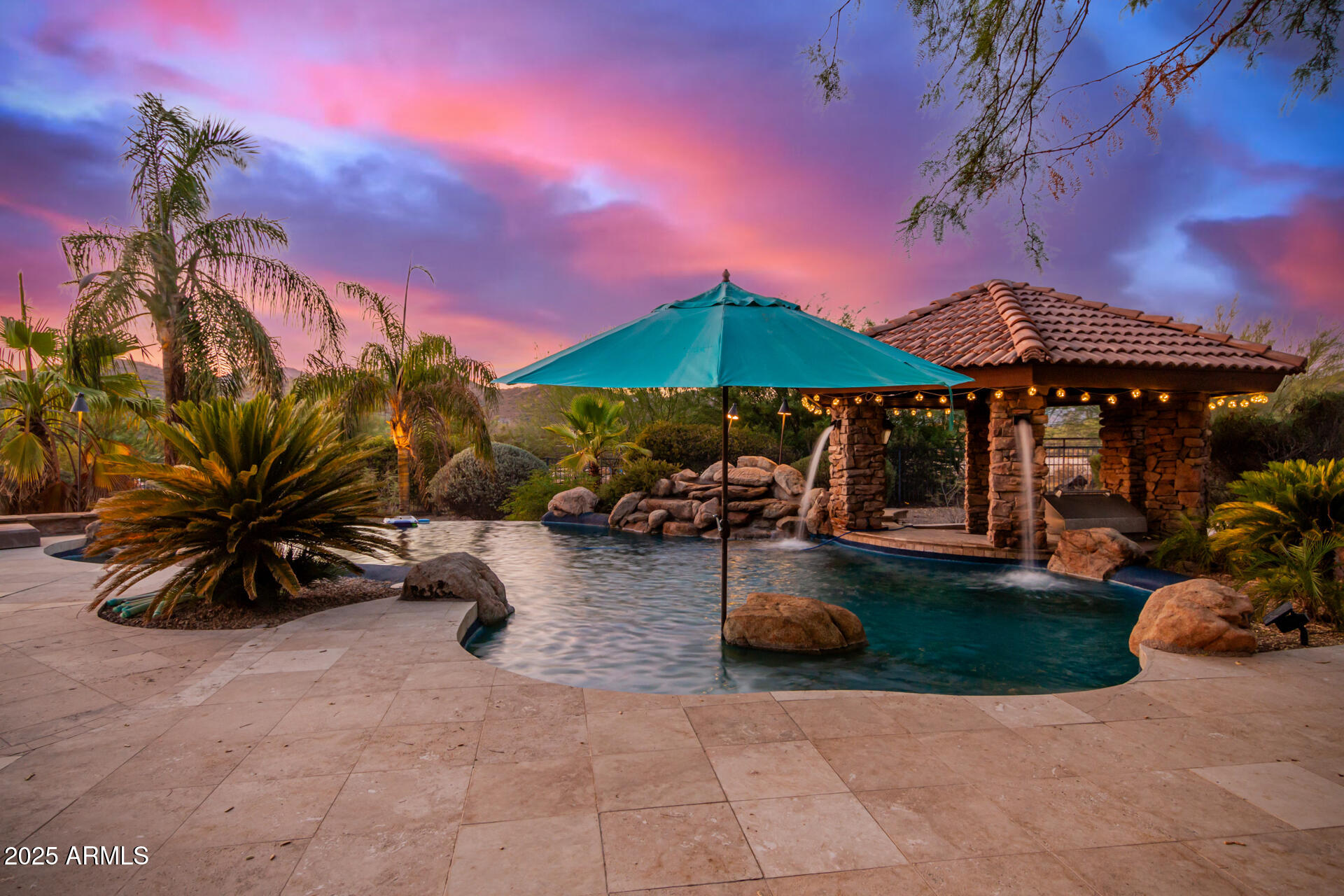 5100 East Cloud Road Cave Creek, AZ 85331 - Photo 2 of 43 a view of a swimming pool with a patio