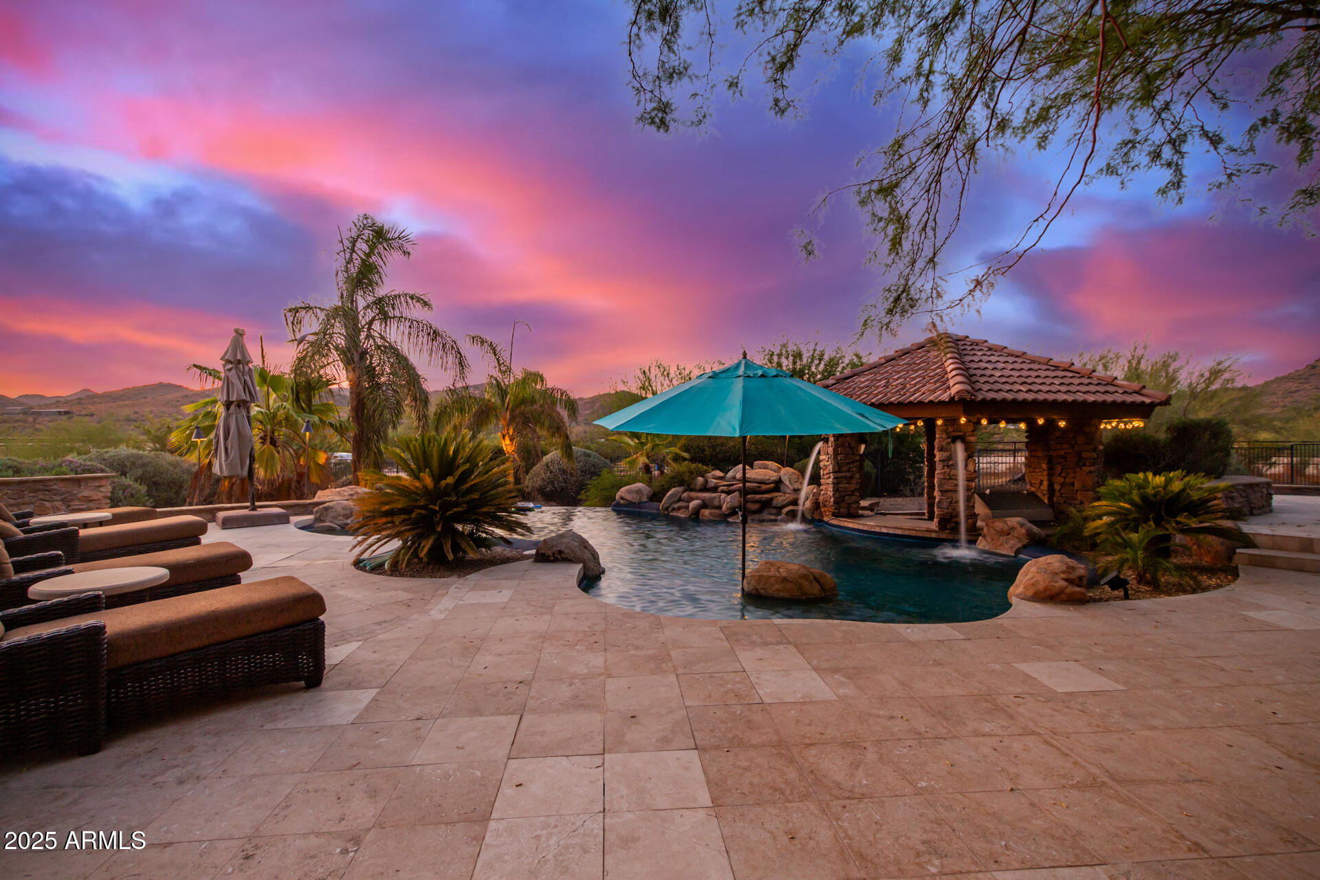 5100 East Cloud Road Cave Creek, AZ 85331 - Photo 38 of 43 a view of a backyard with a patio and a fire pit