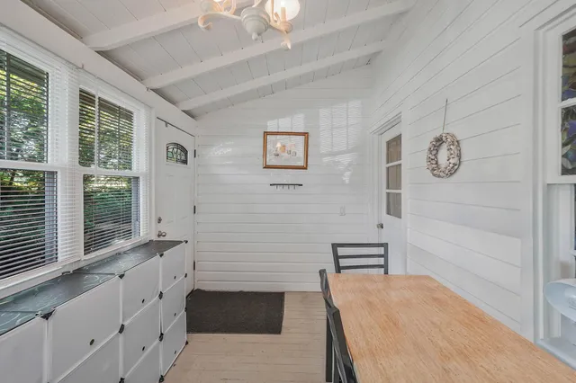 a room with a bed and a window