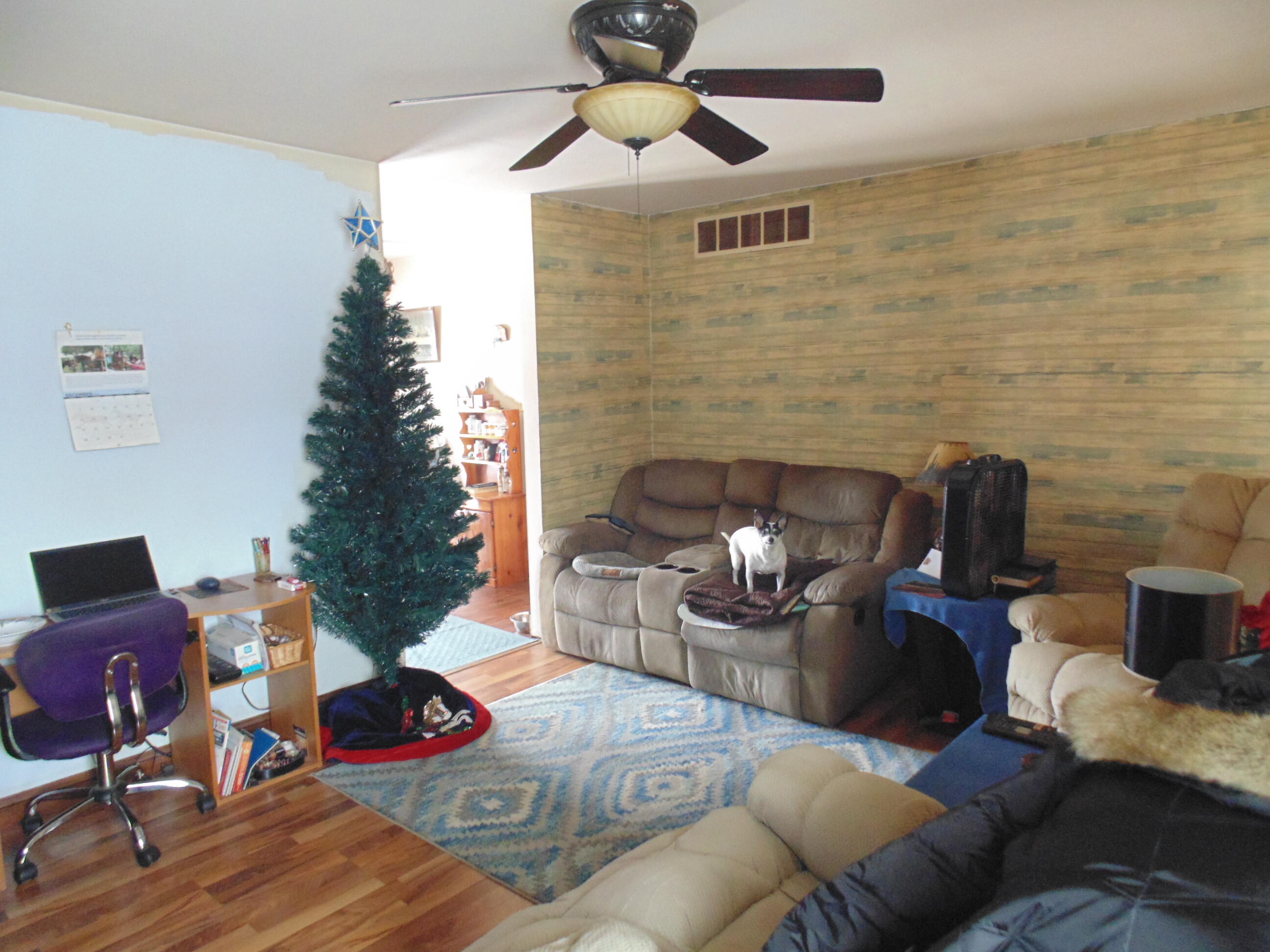 3170 Lawrence Street Hobart, IN 46342 - Photo 7 of 11 a living room with furniture and a fireplace