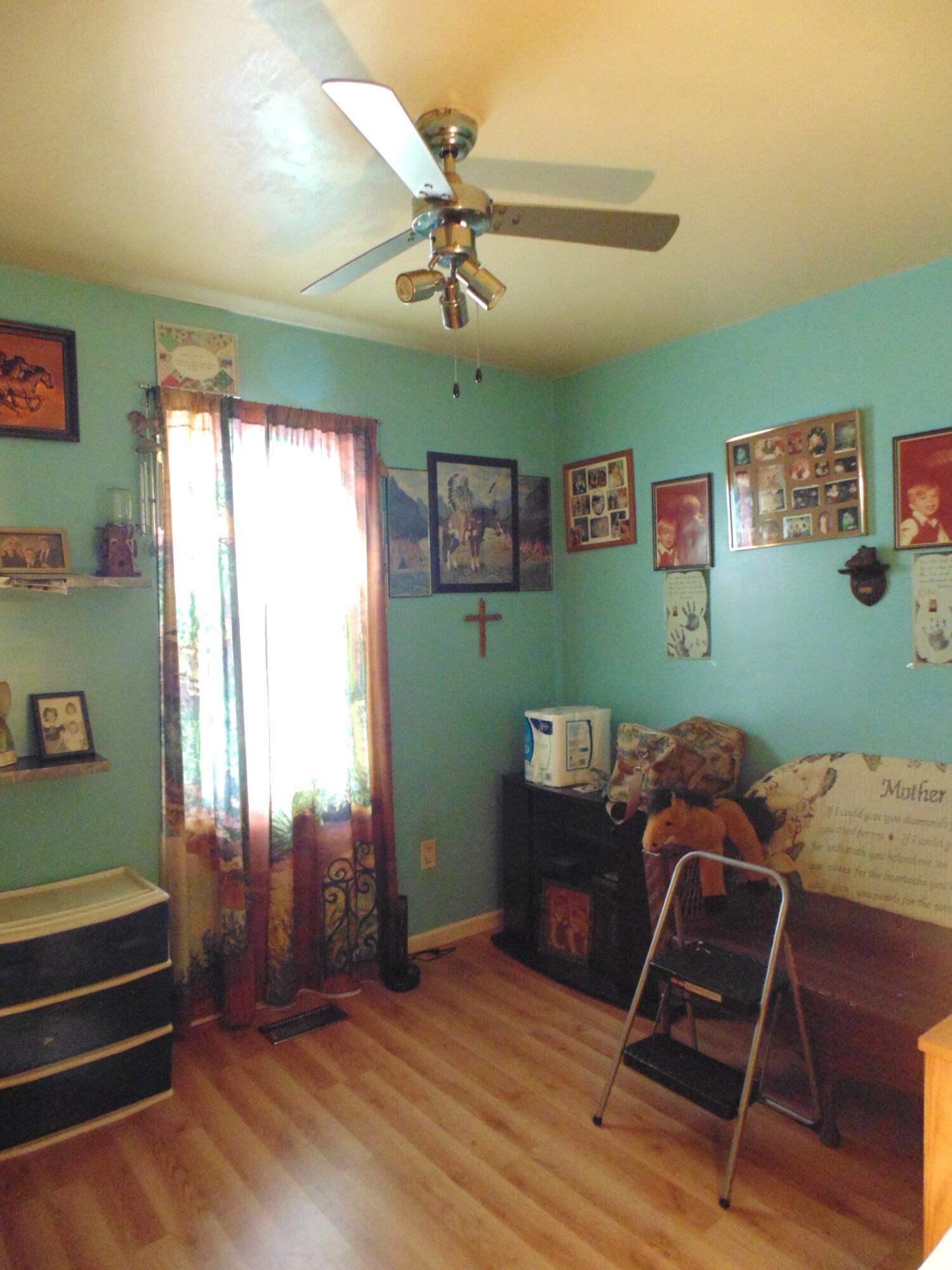 3170 Lawrence Street Hobart, IN 46342 - Photo 10 of 11 a room with furniture and a window