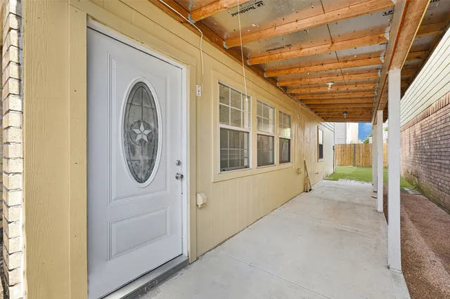 a view of a house with a porch