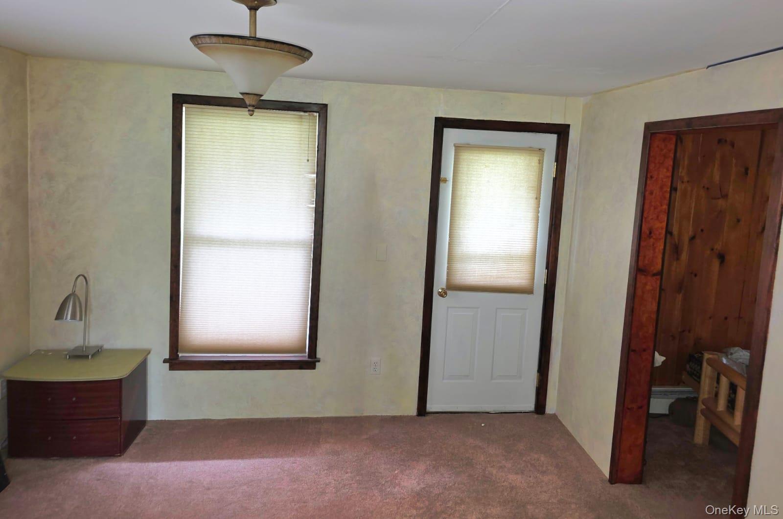 3099 State Rt 17B Cochecton, NY 12726 - Photo 23 of 30 a view of an empty room with a window