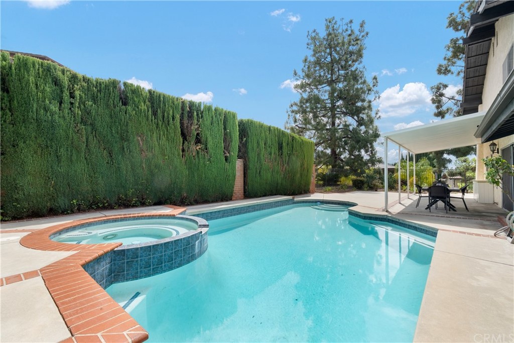 1497 Sunshine Drive Glendale, CA 91208 - Photo 40 of 52 a view of a swimming pool with a patio