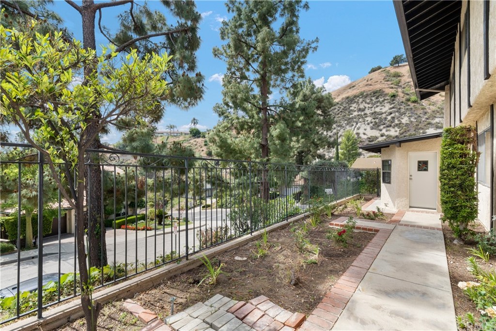 1497 Sunshine Drive Glendale, CA 91208 - Photo 45 of 52 a view of a pathway of a house with a yard