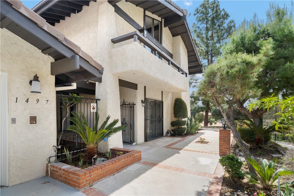1497 Sunshine Drive Glendale, CA 91208 - Photo 4 of 52 a front view of a house with garden