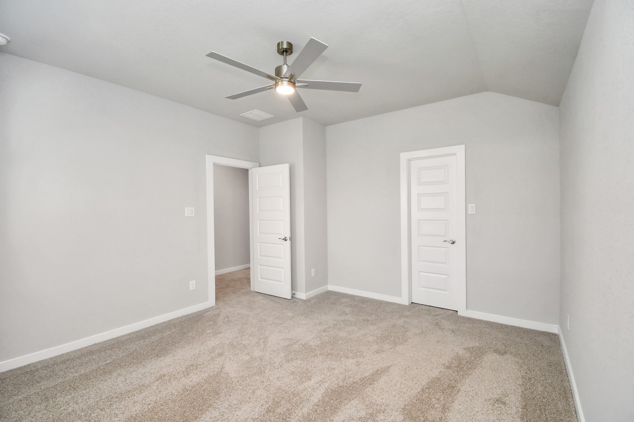 3106 Native Spg Drive Spring, TX 77373 - Photo 32 of 38 Generously sized secondary bedrooms featuring spacious closets, soft and inviting carpeting underfoot, large windows allowing plenty of natural light, and the added touch of privacy blinds for your personal retreat. Sample photo of completed home with similar floor plan. Actual colors and selections may vary.