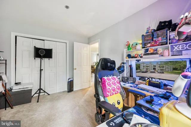 a view of a workspace with furniture