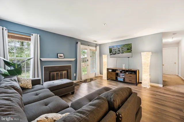 a bedroom with a large bed and a couch