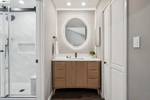 a bathroom with a sink and a mirror
