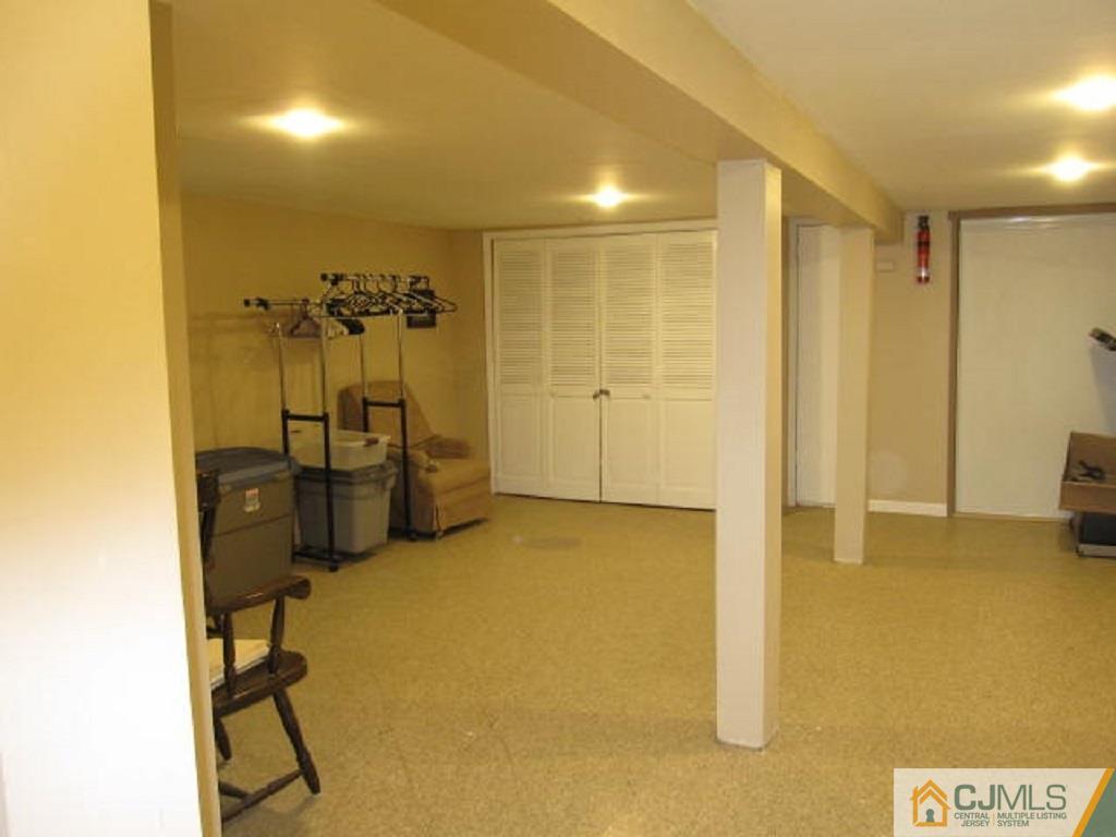 20 Mockingbird Road Edison, NJ 08820 - Photo 17 of 18 a view of a room with gym equipment