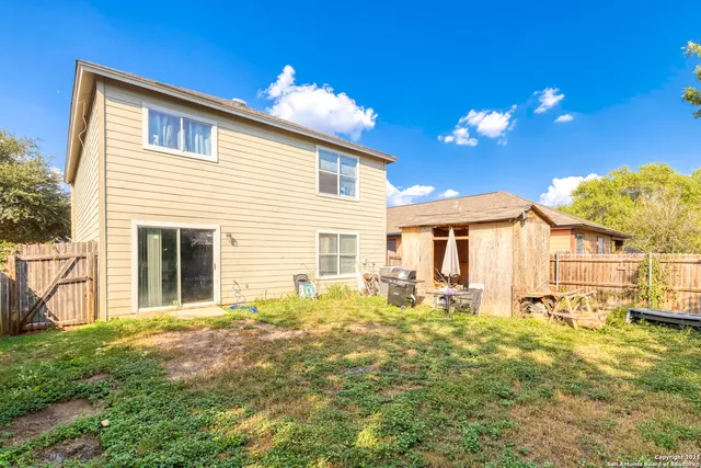 a view of a house with a patio
