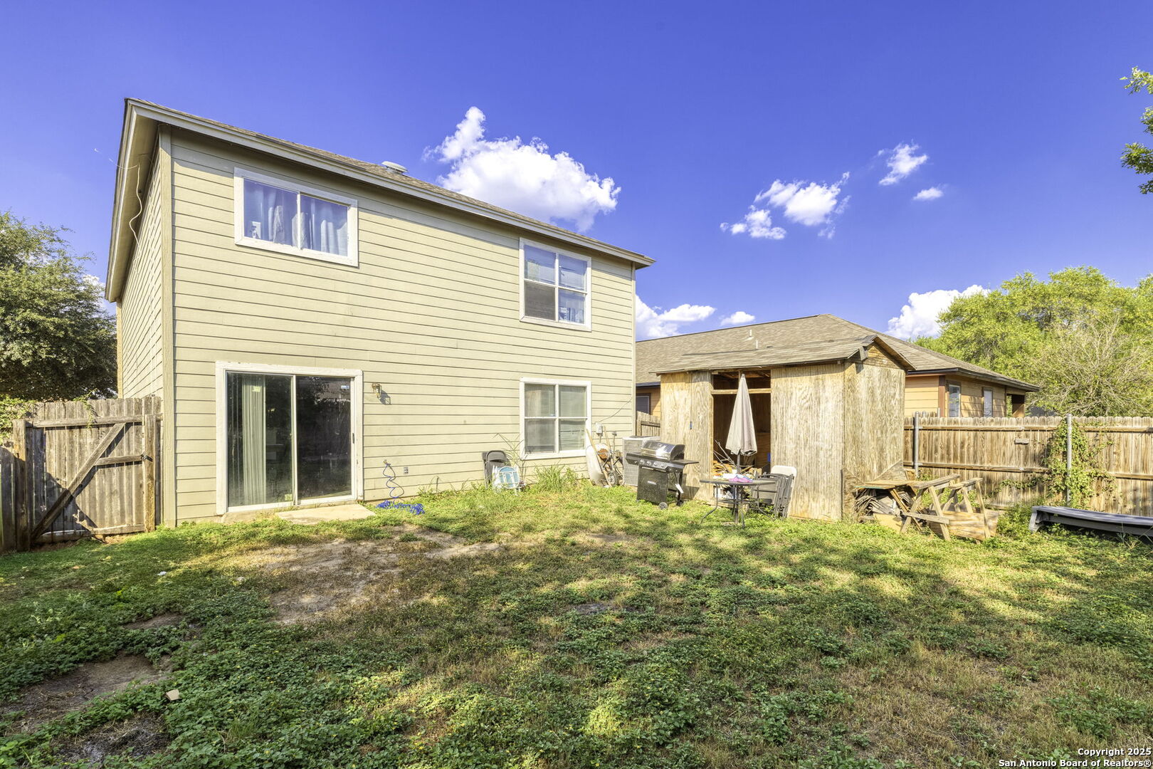 6931 Pecan Converse, TX 78109 - Photo 24 of 25 a view of a house with a patio