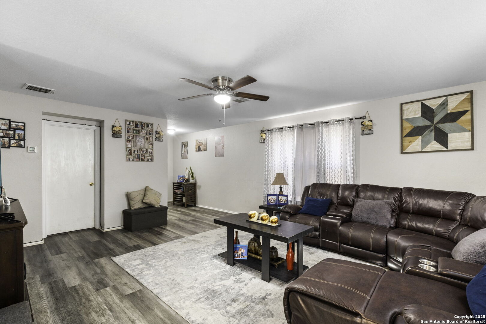 6931 Pecan Converse, TX 78109 - Photo 7 of 25 a living room with furniture and wooden floor