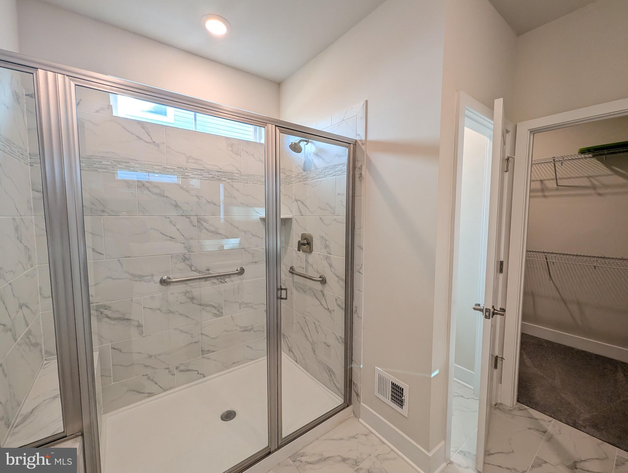 52 Tulip Tree Way Gettysburg, PA 17325 - Photo 16 of 24 a bathroom with a glass shower door and a sink