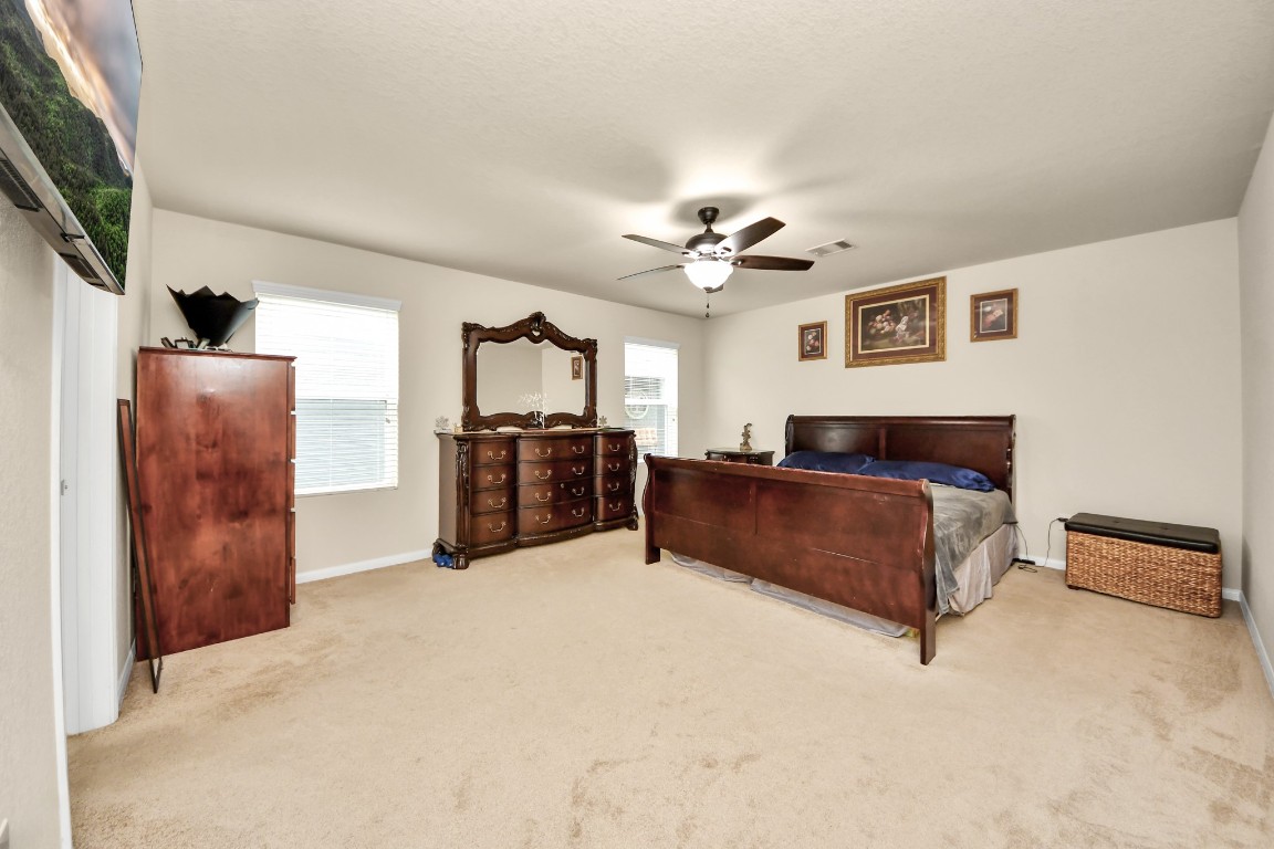 10207 Moonset Lane Houston, TX 77016 - Photo 15 of 34 a living room with furniture and a flat screen tv