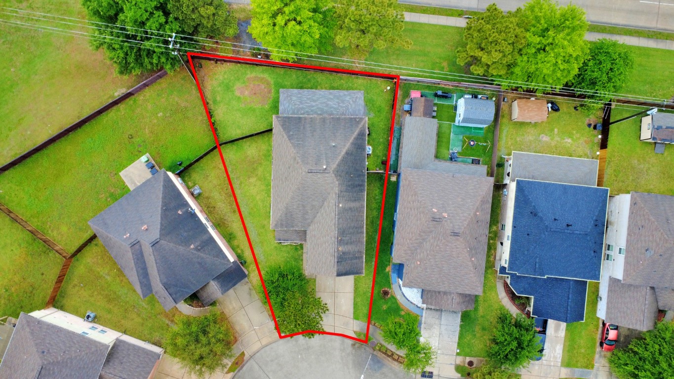 10207 Moonset Lane Houston, TX 77016 - Photo 2 of 34 an aerial view of a house with a yard and furniture