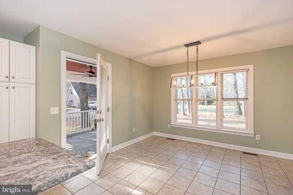 a view of an empty room and window
