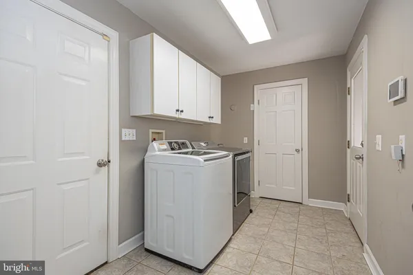 a view of utility room with washer and dryer
