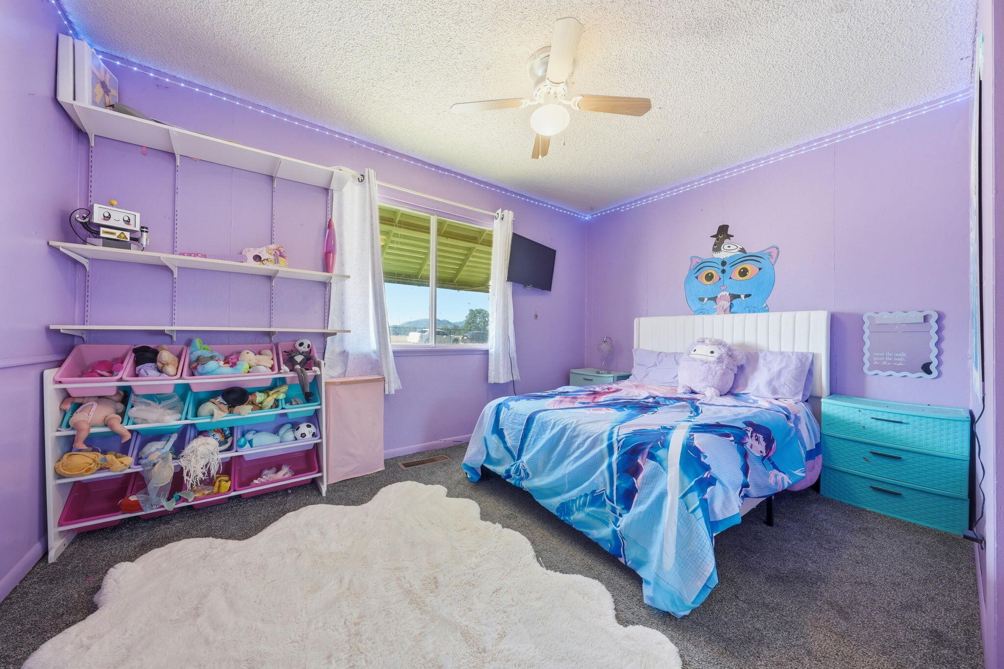 22189 Old Alturas Road Redding, CA 96003 - Photo 17 of 70 a bedroom with a bed and a dresser