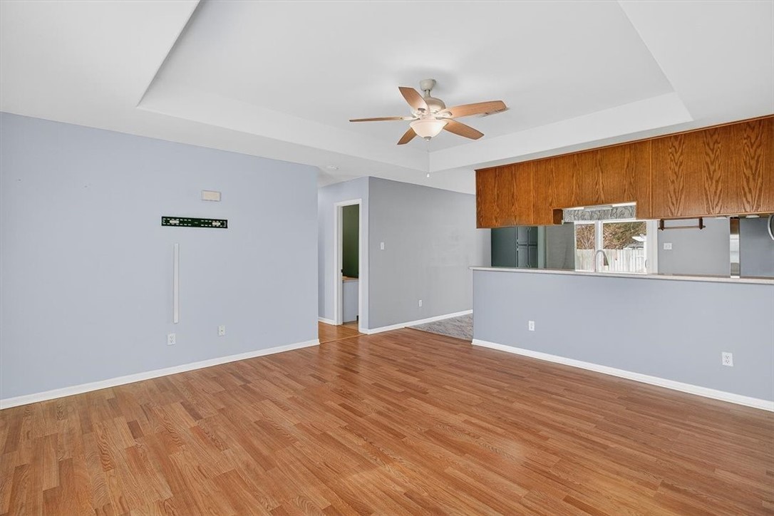 850 Purdue Road Corpus Christi, TX 78418 - Photo 18 of 39 a view of a big room with wooden floor and windows