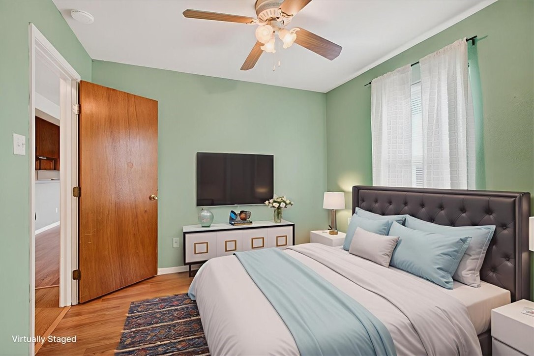 850 Purdue Road Corpus Christi, TX 78418 - Photo 25 of 39 a bedroom with a bed and a flat screen tv