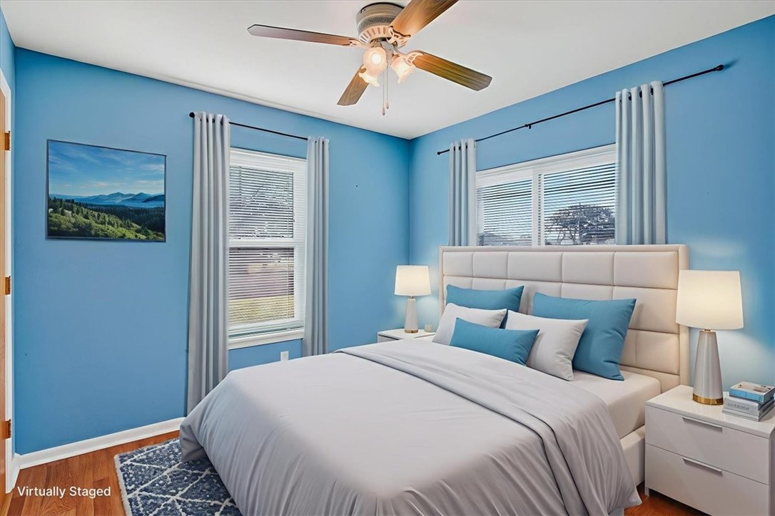 850 Purdue Road Corpus Christi, TX 78418 - Photo 30 of 39 a bedroom with a bed and a painting on the wall