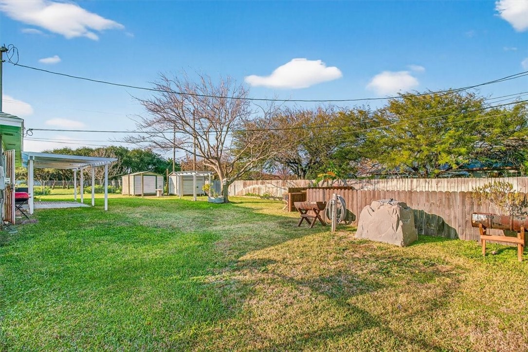 850 Purdue Road Corpus Christi, TX 78418 - Photo 35 of 39 a view of a garden with a bench
