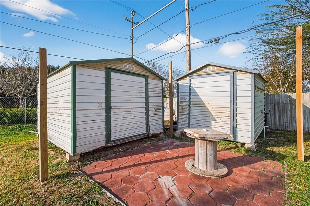 850 Purdue Road Corpus Christi, TX 78418 - Photo 36 of 39 a front view of a house with a yard