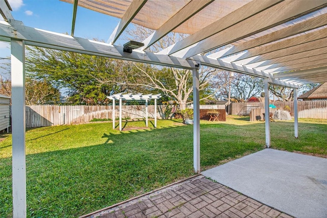 850 Purdue Road Corpus Christi, TX 78418 - Photo 37 of 39 a view of a big room with a big yard potted plants and large tree
