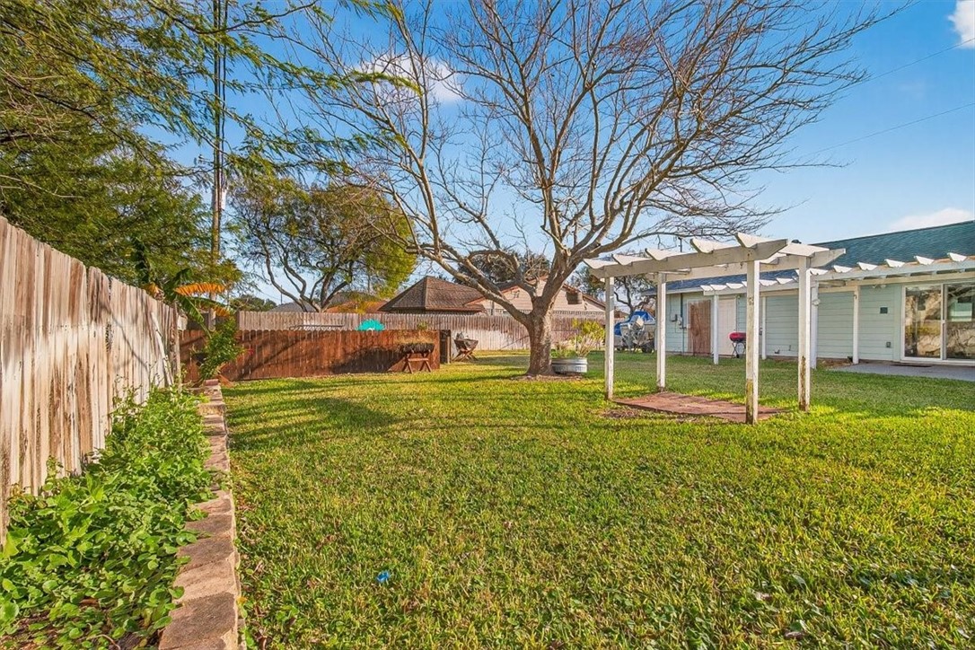 850 Purdue Road Corpus Christi, TX 78418 - Photo 5 of 39 a view of a house with a yard
