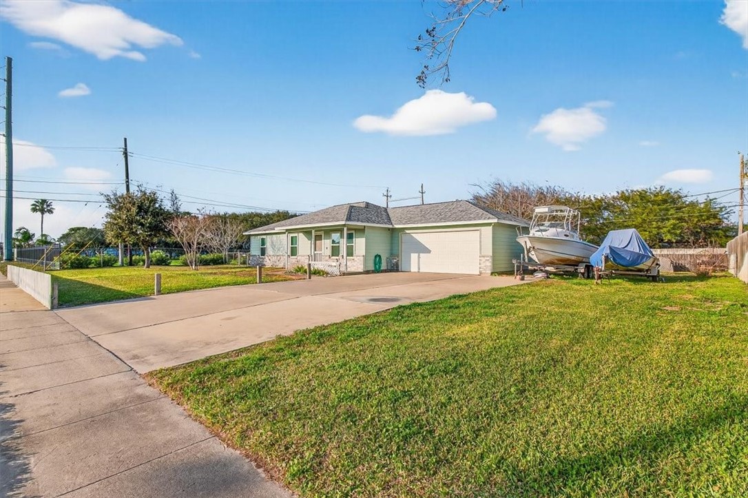 850 Purdue Road Corpus Christi, TX 78418 - Photo 7 of 39 a view of a house with a swimming pool