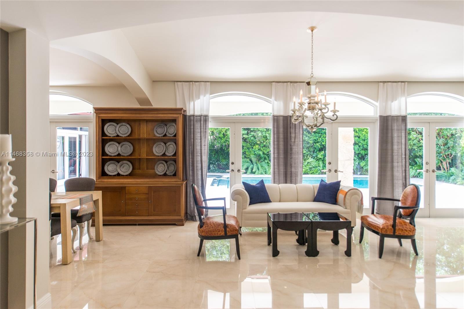 3500 Munroe Drive Coconut Grove, FL 33133 - Photo 9 of 54 a living room with furniture and a large window
